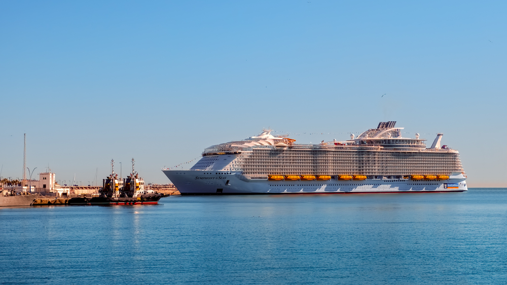 Symphony of the Seas, anchored in the port of Malaga, Spain